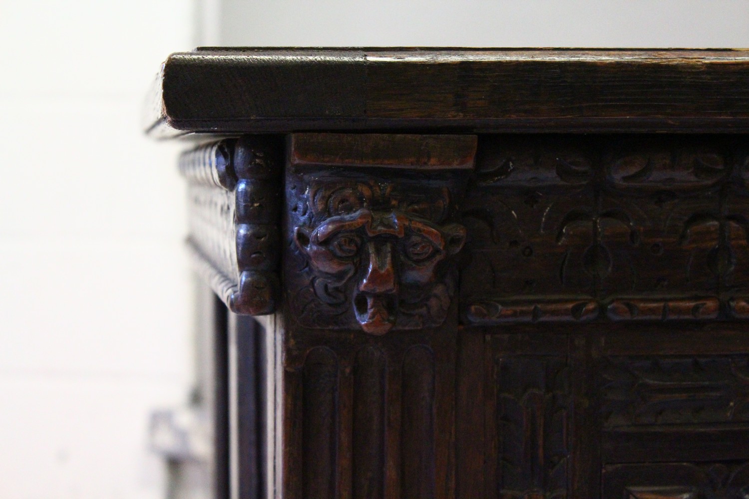 A LARGE 17TH-18TH CENTURY FRENCH OAK COFFER, with two plain panels to the top and two carved - Image 4 of 13