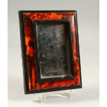 A SMALL 19TH CENTURY TORTOISESHELL MIRROR. 22cms x 16cms.