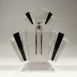 A LARGE ART DECO STYLE BLACK AND CLEAR GLASS SCENT BOTTLE. 23cms high.