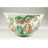 A CHINESE KANGXI PERIOD FAMILLE VERTE PORCELAIN BOWL, circa 1700, of larger than average size, the