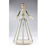 A RARE 19TH CENTURY BASTIDOR ITALIAN SANTOS WOODEN CAGE DOLL, with articulated arms, on an oval