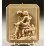 A 19TH CENTURY CARVED PANEL, classical nudes. 18cms x 15cms.