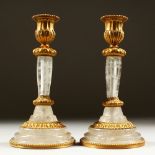 A PAIR OF ROCK CRYSTAL AND ORMOLU CANDELABRA. 20cms high.