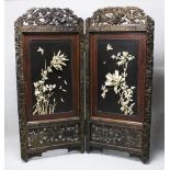 A LARGE JAPANESE MEIJI PERIOD TWO-FOLD HARDWOOD & SHIBAYAMA SCREEN, , the panels decorated in