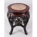 A SMALL 19TH CENTURY CHINESE MARBLE TOP HARDWOOD TABLE / PLANTER, the top inset with marble, the