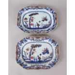 A GOOD PAIR OF 18TH CENTURY CHINESE DISHES, blue and gilt ground with foliage and birds. 33cms