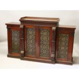 A GOOD REGENCY MAHOGANY BREAKFRONT SIDE CABINET, the top with raised shelf over four panel doors