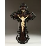 A SUPERB 19TH CENTURY ITALIAN CARVED IVORY CORPUS CHRISTI, on a carved and etched cross. Figure