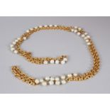 A CHANEL LONG PEARL NECKLACE