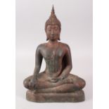 A TIBETAN BRONZE MODEL OF A SEATED BUDDHA. 36cms high.