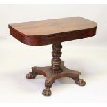 A LATE REGENCY MAHOGANY TEA TABLE, with plain folding top, centre carved column, platform base,