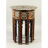 A MOORISH MOTHER-OF-PEARL AND EBONY INLAID TABLE 40cms x 50cms high.