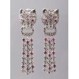 A PAIR OF RUBY SET SILVER "PANTHER" DROP EARRINGS.