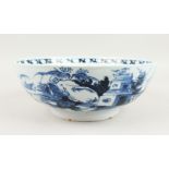 A LARGE 18TH CENTURY DELFT BLUE AND WHITE PUNCH BOWL, the sides with a continuous Chinese design.