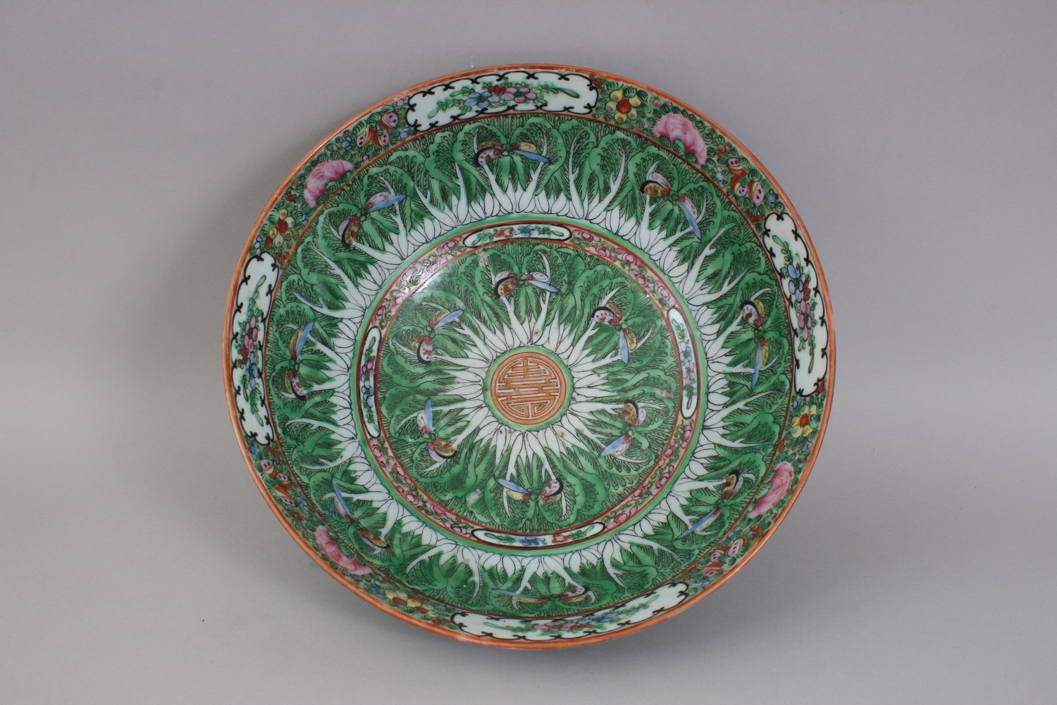 AN EARLY 20TH CENTURY CHINESE CANTON BUTTERFLY AND CABBAGE LEAF BOWL. 31cms diameter. - Image 5 of 7