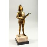 AN ART DECO GILDED BRONZE AND IVORY FIGURE OF A MAN PLAYING A MANDOLIN, on a stepped marble base.