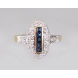 A 9CT GOLD, CALIBRE CUT SAPPHIRE AND DIAMOND DECO RING.