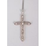 AN 18CT GOLD CHAIN AND CROSS, set with diamonds.
