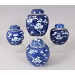 FOUR VARIOUS 19TH CENTURY AND EARLY 20TH CENTURY BLUE AND WHITE GINGER JARS AND COVERS, with