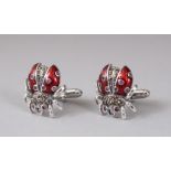 A PAIR OF SILVER AND RED ENAMEL LADYBIRD CUFFLINKS.