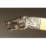 A RUSSIAN SILVER AND IVORY HORSES HEAD PAPER KNIFE.