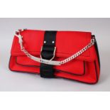 A VERY GOOD CHRISTIAN DIOR RED AND BLACK BAG, with chrome handle, in original box.