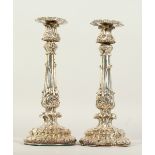 A GOOD PAIR OF PLATED CIRCULAR CANDLESTICKS. 29cms high.