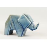 A CUBIST PORCELAIN MODEL OF AN ELEPHANT.