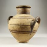 A LARGE CYPRIOT ANTIQUITY POTTERY TWO-HANDLED VESSEL. 30cms high.