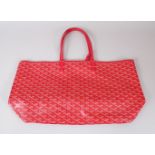 A RED E. GOYARD BAG.