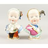 A PAIR OF MEISSEN PORCELAIN BUSTS OF CHILDREN, in brilliant colours. Cross swords mark in blue.