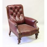 A GOOD VICTORIAN LARGE MAHOGANY FRAMED LEATHER ARMCHAIR with button back, curving arms, serpentine