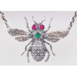 A LARGE SILVER "BEE" PENDANT AND CHAIN.