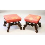 A GOOD PAIR OF VICTORIAN STOOLS, with padded tops and cross frame supports.