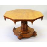 A VERY GOOD POLLARD OAK GOTHIC REVIVAL OCTAGONAL TOP CENTRE TABLE with carved Gothic column and