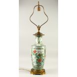 A 19TH CENTURY CHINESE FAMILLE VERTE PORCELAIN VASE CONVERTED TO A LAMP, the body of the vase with