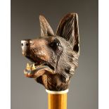 A VICTORIAN UMBRELLA, the handle as a BLACK FOREST CARVED WOOD ALSATIAN'S HEAD, with glass eyes
