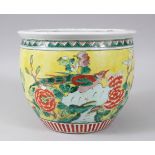 A 19TH CENTURY CHINESE FAMILLE VERTE AND JEUNE JARDINIERE, painted with flowers. 23cms diameter.