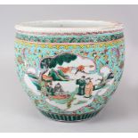 A 19TH CENTURY CHINESE FAMILLE ROSE-VERTE JARDINIERE, the interior painted with fish. 23cms