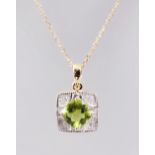 A 9CT GOLD, PERIDOT AND DIAMOND PENDANT AND CHAIN.
