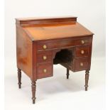 A GEORGIAN MAHOGANY RENT DESK, with lift-up flap, fitted interior, over one long and four small