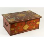 A 19TH CENTURY INDIAN TEAK AND BRASS STUDDED BOX, the hinged top opening to reveal a compartmented