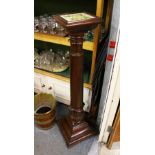 A GOOD 19TH CENTURY MAHOGANY TORCHERE WITH TILE INSET TOP, on column support with square base.