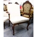 A GOOD GEORGIAN MAHOGANY ARMCHAIR, with padded back and seat, carved curving arms, on cabriole