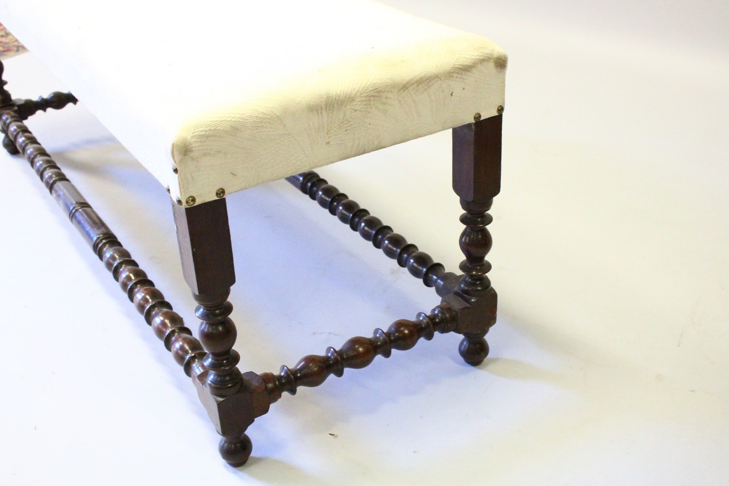 A GOOD LONG FOOTSTOOL with padded top on turned supports. 120cms long x 42cms wide. - Image 3 of 3