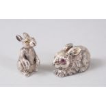 TWO NOVELTY SILVER RABBITS.