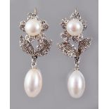 A PAIR OF 9CT GOLD AND SILVER SET PEARL DROP EARRINGS.