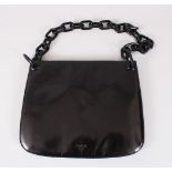 A PRADA BLACK BAG, with chain link handle, in outer case.
