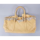 A BOTTEGA VENETA BEIGE AND SILVER PATTERN BAG, in outer case.