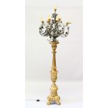 A VERY GOOD LOUIS XVITH CARVED GILTWOOD TORCHERE, the top with seven scrolling arms, column